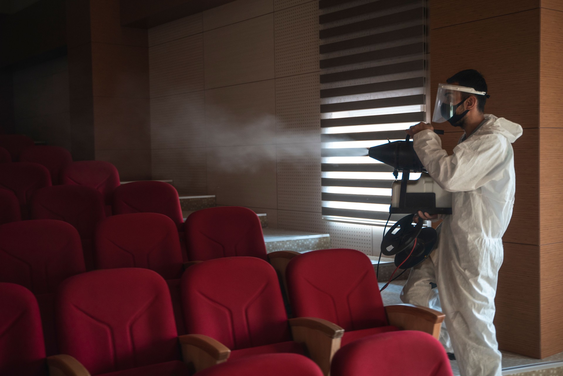 Man who works in disinfecting in halls as part of the fight against corona virus